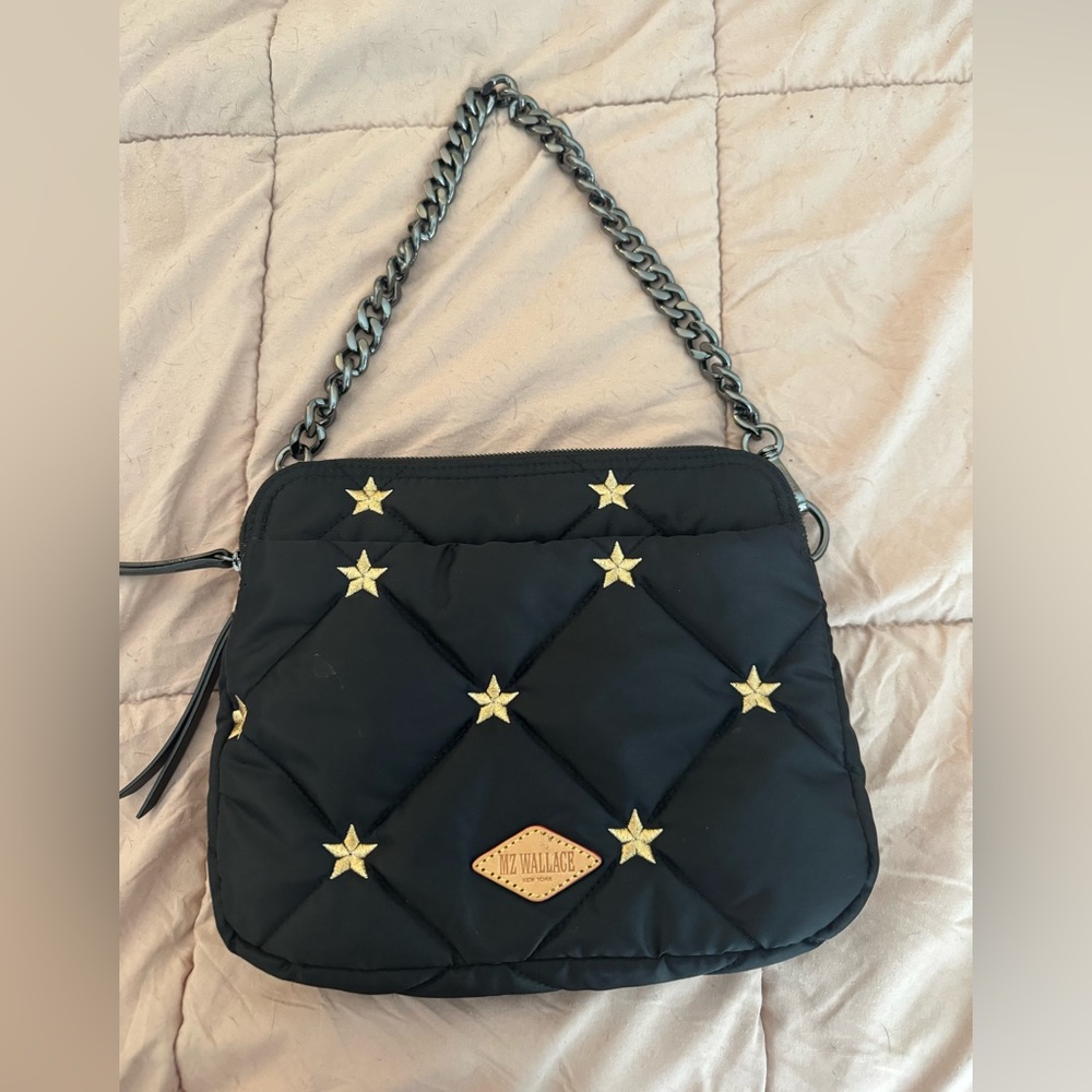 Black MZ Wallace with stars and bright blue interior